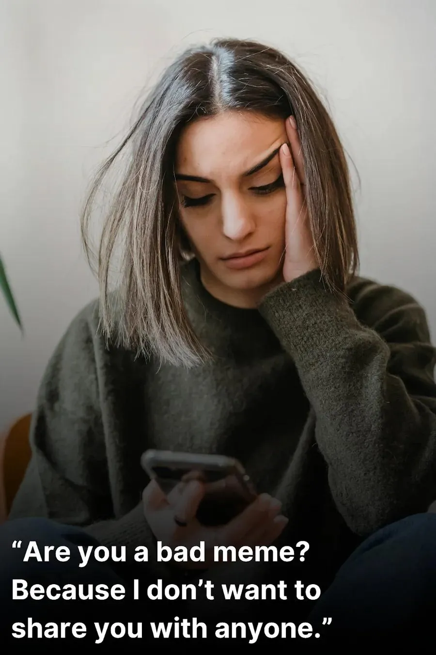 Young woman looking displeased after reading a bad pick up line on her phone