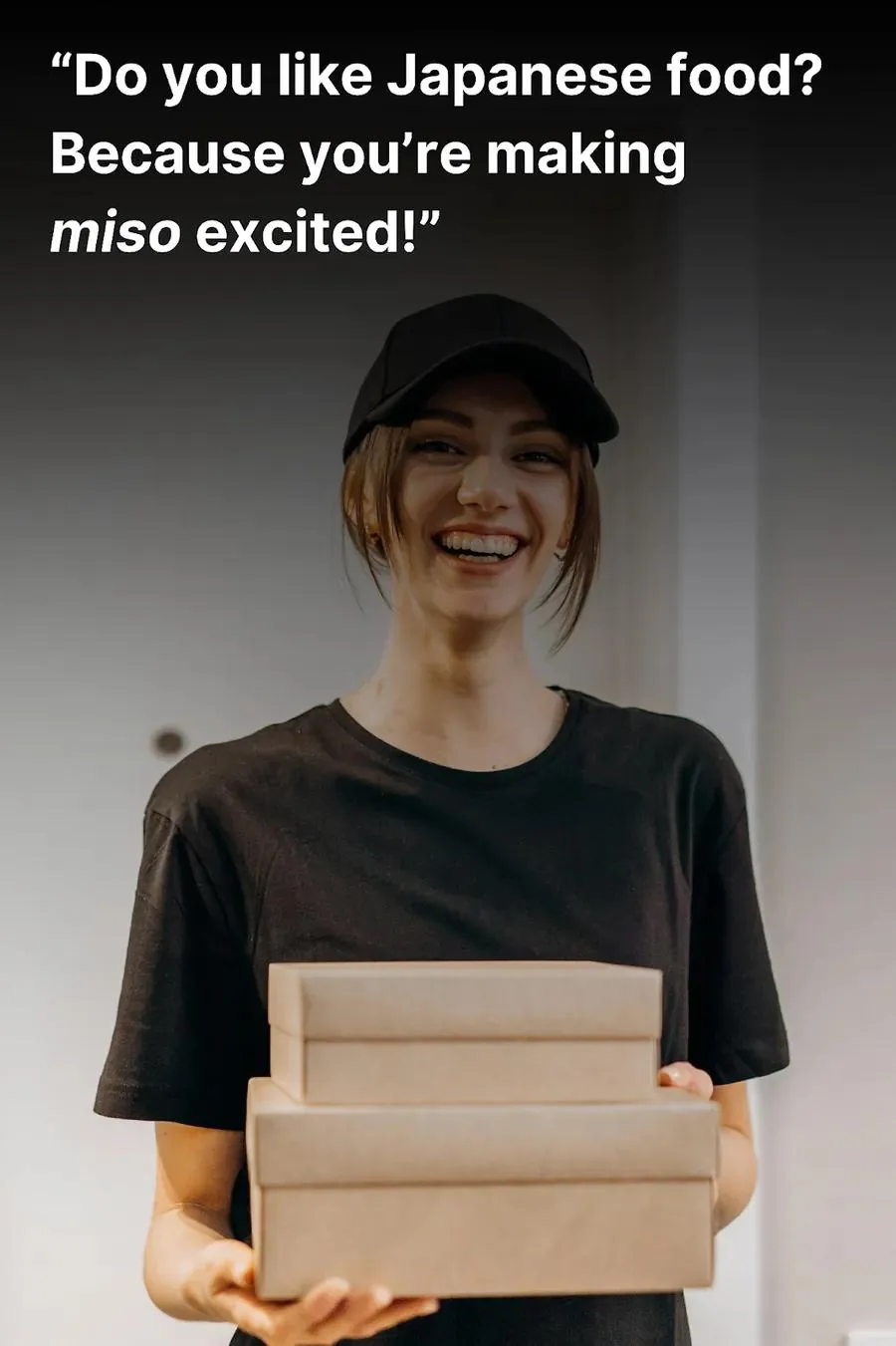 Attractive delivery woman laughing after hearing a bad (but funny) pick up line