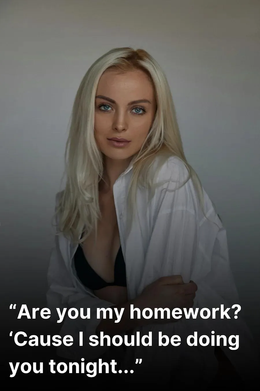 Beautiful woman in a white shirt smiling seductively after hearing a NSFW pick up line for Tinder.